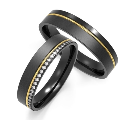 Black gold ring titanium alloy with gold set in a ring of zircon